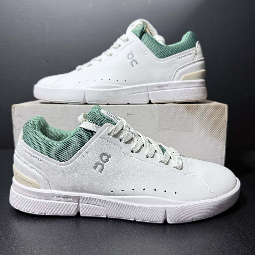 On Running White and Green Athletic Shoes